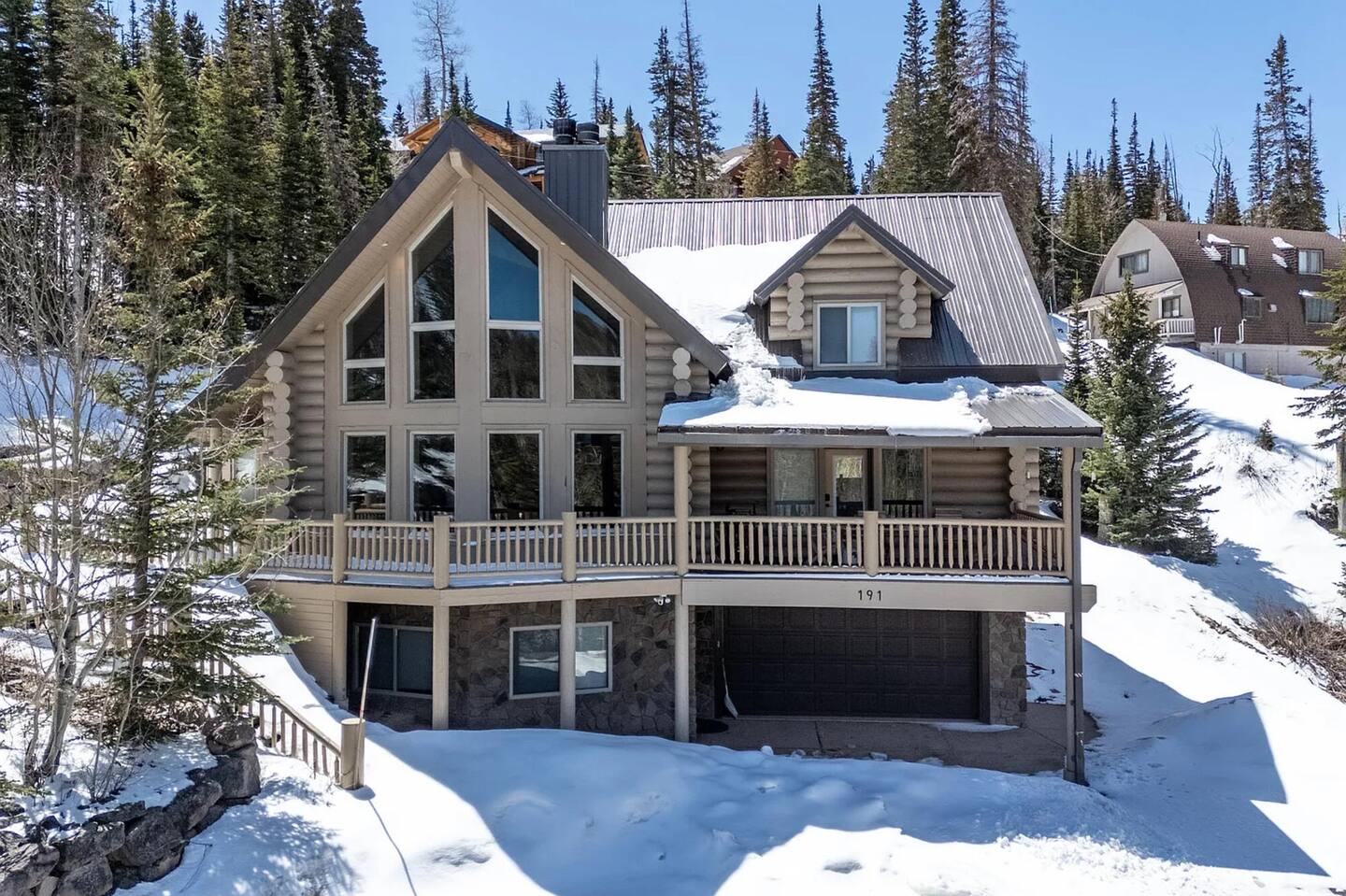 Cozy mountain cabin exterior in Brian Head, Utah at sunset